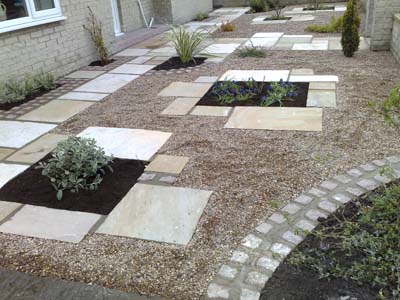 Gravel and Paving Patio with flowerbeds